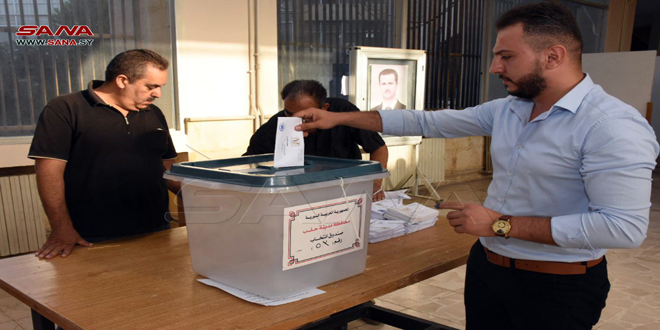 Фото с избирательных участков в различных провинциях Сирии